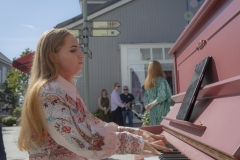 Soprano Eva Kavanagh performing at Kildare Village with Conor Prendeville and Ella Nagy, to mark the presentation of the inaugural Bríd Phelan Emerging Talent Award. The event celebrates one month to go until Blackwater Valley Opera Festival (27 May - 2 June 2025 www.blackwatervalleyopera.ie). Photo credit:Mark Reddy
