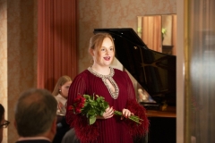 Soprano Eva Kavanagh performing at Kildare Village with Conor Prendeville and Ella Nagy, to mark the presentation of the inaugural Bríd Phelan Emerging Talent Award. The event celebrates one month to go until Blackwater Valley Opera Festival (27 May - 2 June 2025 www.blackwatervalleyopera.ie). Photo credit:Mark Reddy