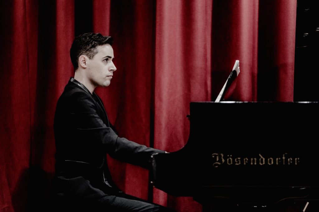 Niall Kinsella playing a grand piano